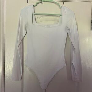 white aritzia long sleeve square neck bodysuit